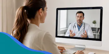 Woman having a secure, convenient video consultation with a dermatologist